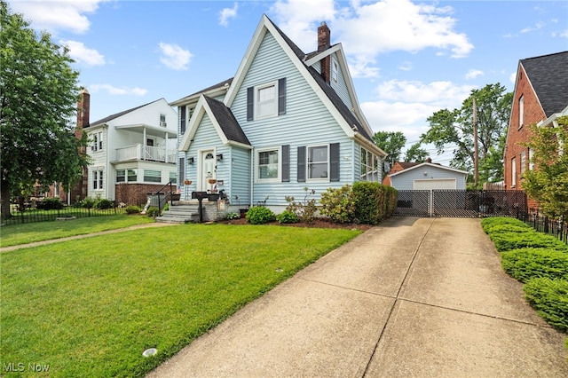 6478 Kerneywood Rd, Parma, OH 44129 - view of front of home with a chimney, a garage, an outbuilding, and roof with shingles