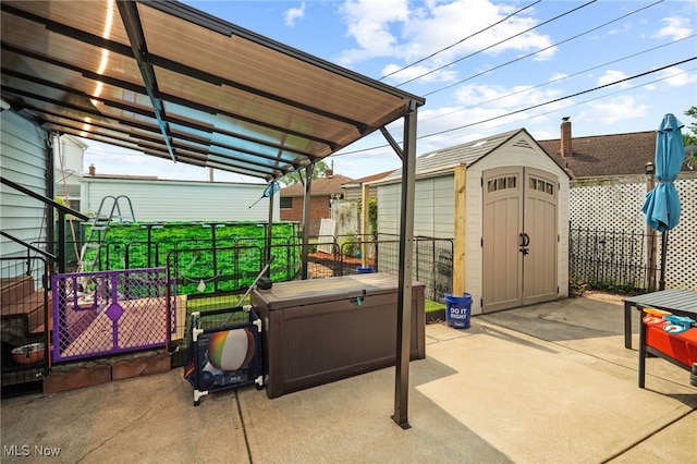 6478 Kerneywood Rd, Parma, OH 44129 - view of patio / terrace featuring a shed