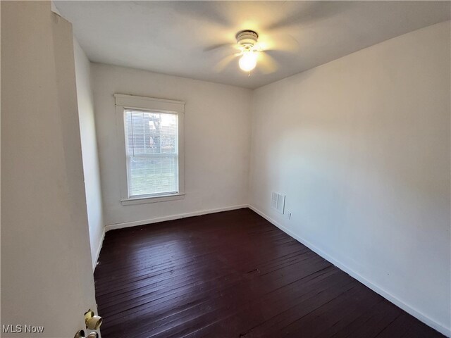1825 Lakeview Rd, East Cleveland, OH 44112 - unfurnished room with dark wood finished floors and ceiling fan