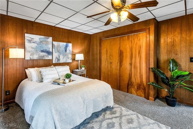 125 N Arlington Ave, Niles, OH 44446 - carpeted bedroom featuring wooden walls and a closet