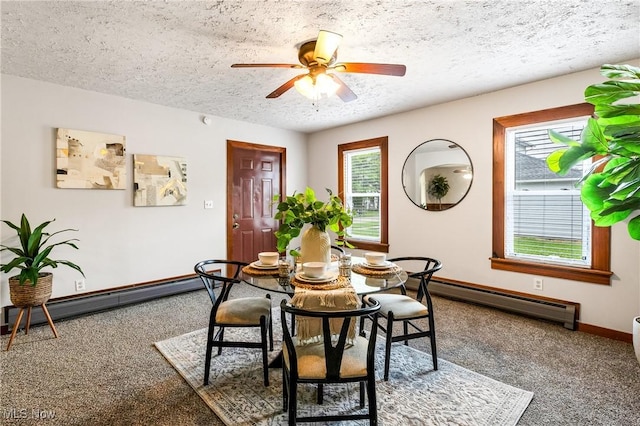 125 N Arlington Ave, Niles, OH 44446 - dining room featuring baseboard heating, a baseboard heating unit, a textured ceiling, ceiling fan, and carpet flooring
