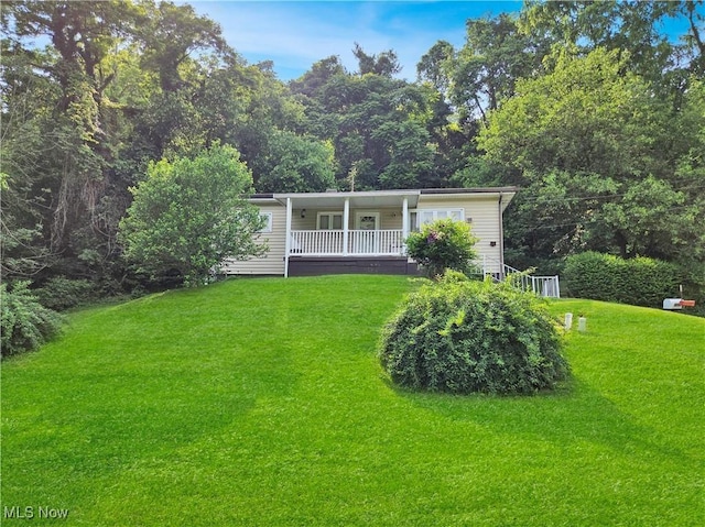 5197 Atchison Rd, Bellaire, OH 43906 - view of front facade with a front lawn and a porch