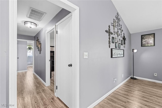 321 Stuart St NW, Lehigh Twp, OH 44646 - hallway with wood finished floors and baseboards