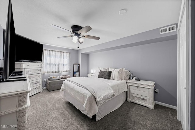 321 Stuart St NW, Lehigh Twp, OH 44646 - carpeted bedroom featuring a ceiling fan and baseboards