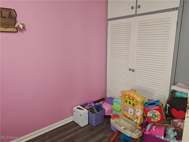 3211 Latimer Ave, Ashtabula, OH 44004 - playroom with wood finished floors and baseboards