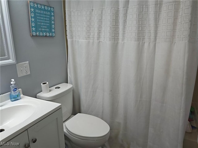 3211 Latimer Ave, Ashtabula, OH 44004 - bathroom with vanity and a shower with curtain