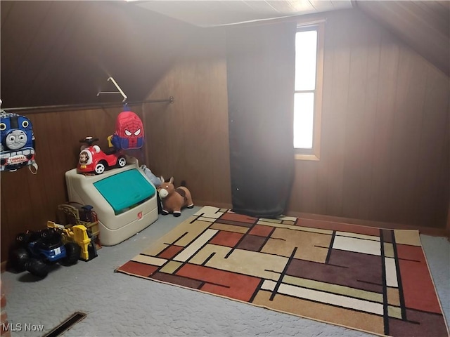 3211 Latimer Ave, Ashtabula, OH 44004 - bonus room featuring lofted ceiling, wood walls, and carpet flooring