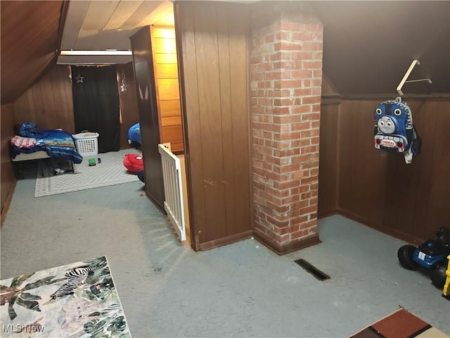 3211 Latimer Ave, Ashtabula, OH 44004 - hallway featuring vaulted ceiling and wood walls