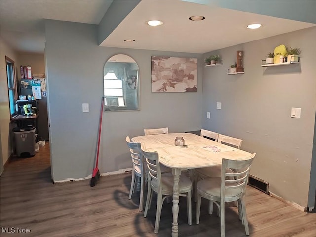 3211 Latimer Ave, Ashtabula, OH 44004 - dining space featuring wood finished floors, recessed lighting, and arched walkways