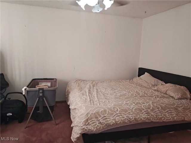 3211 Latimer Ave, Ashtabula, OH 44004 - carpeted bedroom with a ceiling fan