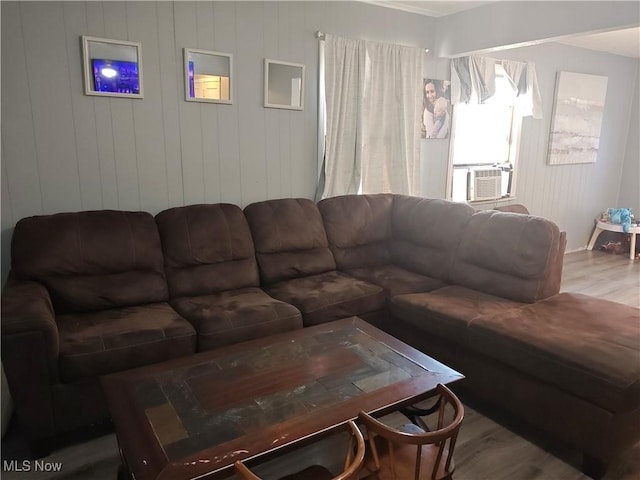 3211 Latimer Ave, Ashtabula, OH 44004 - living area featuring wood finished floors and cooling unit