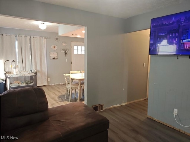 3211 Latimer Ave, Ashtabula, OH 44004 - living room featuring wood finished floors
