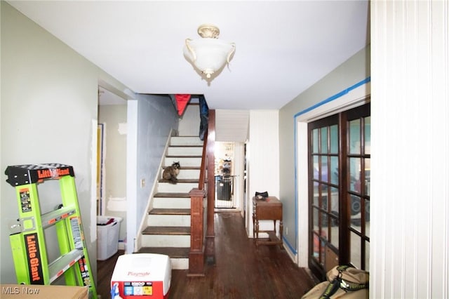 4896 High Hill Rd, Cambridge, OH 43725 - staircase featuring wood finished floors and french doors