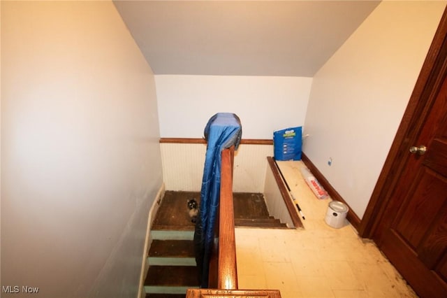 4896 High Hill Rd, Cambridge, OH 43725 - stairs featuring tile patterned floors and lofted ceiling