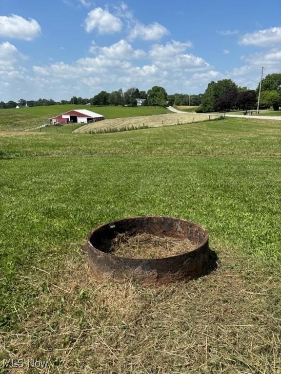 4896 High Hill Rd, Cambridge, OH 43725 - view of green lawn with a view of countryside and an outdoor fire pit