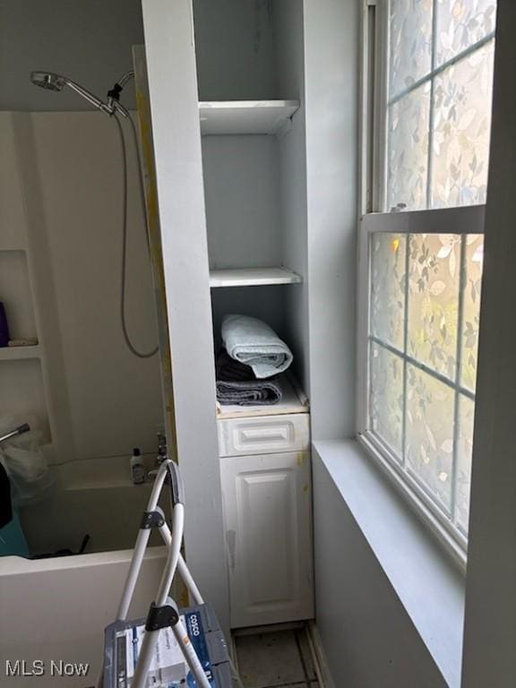 4896 High Hill Rd, Cambridge, OH 43725 - full bath featuring healthy amount of natural light and bathing tub / shower combination