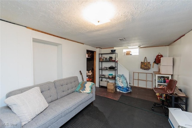 4410 Silsby Rd, University Heights, OH 44118 - living room featuring a textured ceiling