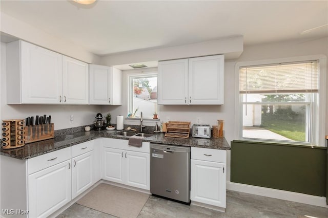 4410 Silsby Rd, University Heights, OH 44118 - kitchen with dishwasher, white cabinetry, and dark stone counters