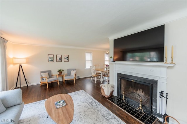 4410 Silsby Rd, University Heights, OH 44118 - living area featuring wood finished floors and a fireplace