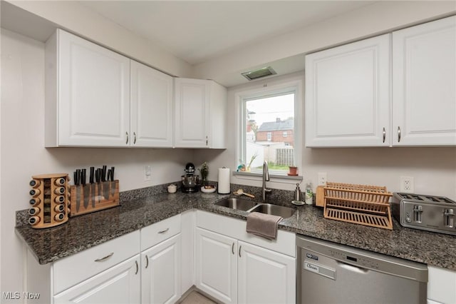 4410 Silsby Rd, University Heights, OH 44118 - kitchen with dishwasher, white cabinets, and dark stone countertops