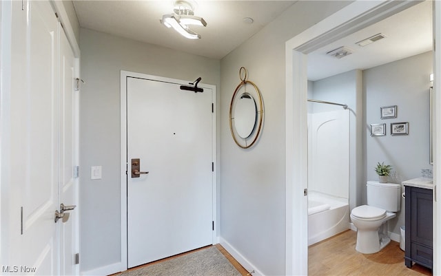 1846 Front St Unit 402, Cuyahoga Falls, OH 44221 - full bathroom with vanity, shower / washtub combination, and wood finished floors