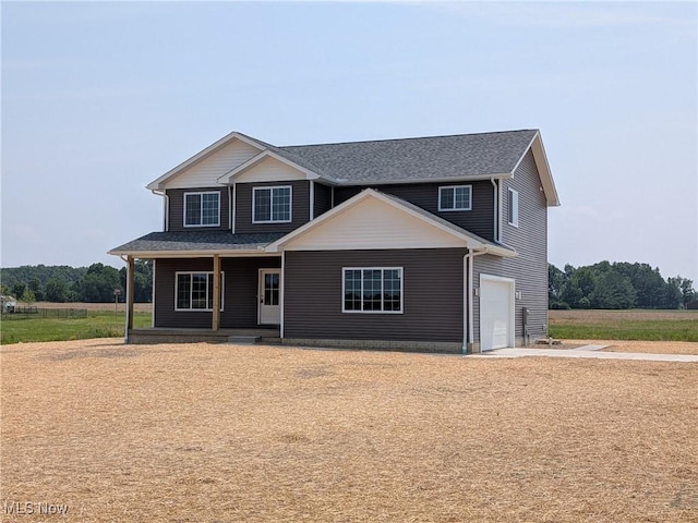 41861 State Route 303, Lagrange, OH 44050 - view of front of home with a porch and an attached garage