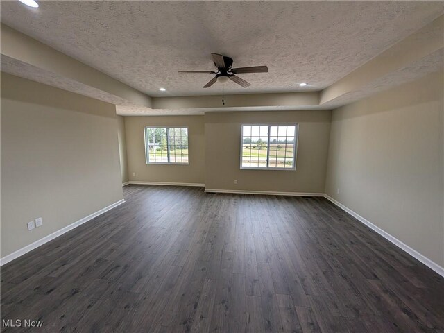 41861 State Route 303, Lagrange, OH 44050 - empty room featuring a textured ceiling, ceiling fan, dark wood finished floors, and recessed lighting