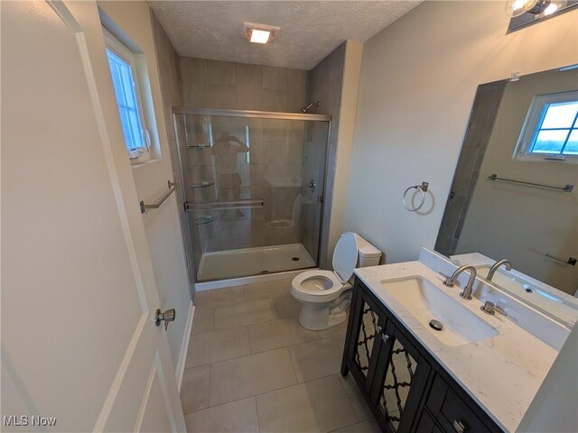 41861 State Route 303, Lagrange, OH 44050 - full bath with a shower stall, vanity, tile patterned flooring, and a textured ceiling