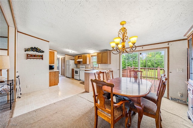 6835 Sidley Rd, Thompson, OH 44086 - dining area with a chandelier, a textured ceiling, light carpet, lofted ceiling, and crown molding