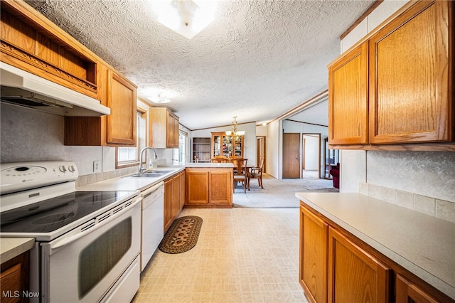 6835 Sidley Rd, Thompson, OH 44086 - kitchen with white appliances, premium range hood, a textured ceiling, a peninsula, and a chandelier