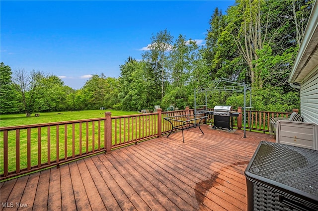 6835 Sidley Rd, Thompson, OH 44086 - wooden terrace featuring grilling area and a lawn