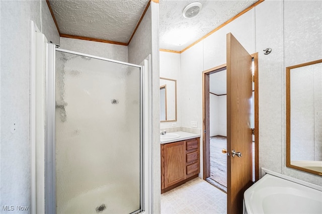 6835 Sidley Rd, Thompson, OH 44086 - full bathroom featuring a stall shower, vanity, crown molding, a garden tub, and a textured ceiling