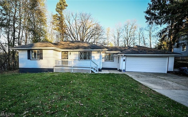 5203 Forest Ave, Maple Heights, OH 44137 - ranch-style home featuring concrete driveway, a front yard, a garage, and a porch