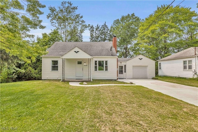 1530 Franklin Ave, Kent, OH 44240 - view of front of property featuring a chimney, concrete driveway, a garage, and a front yard