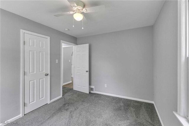 1530 Franklin Ave, Kent, OH 44240 - unfurnished bedroom featuring carpet flooring and ceiling fan