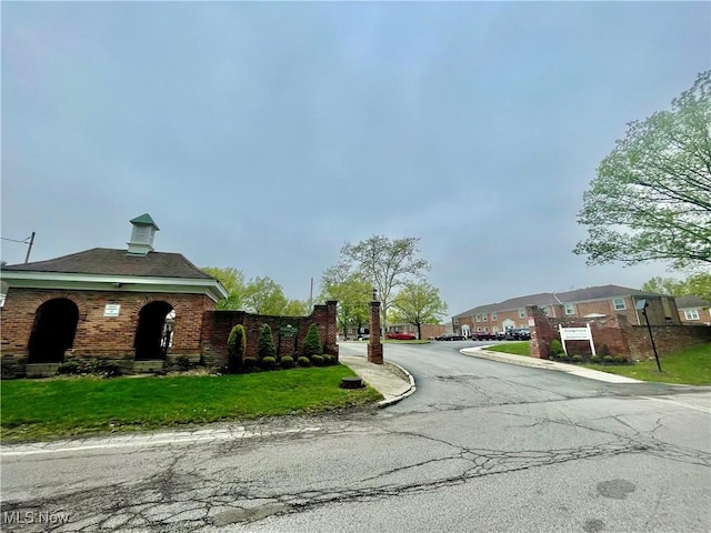 13 Charleston Sq, Euclid, OH 44143 - view of asphalt road featuring curbs and street lights