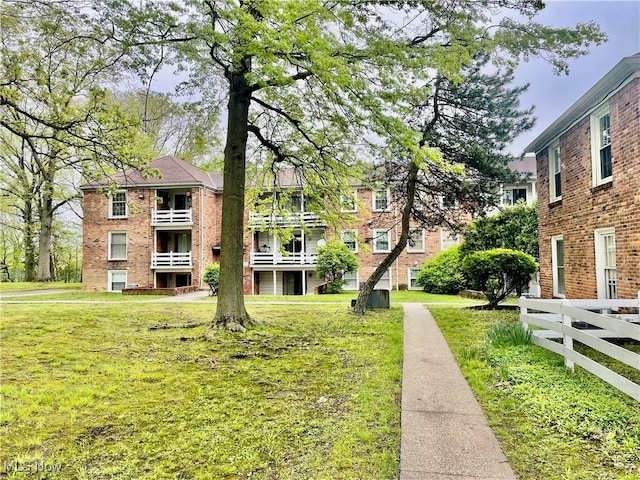 13 Charleston Sq, Euclid, OH 44143 - surrounding community with a yard
