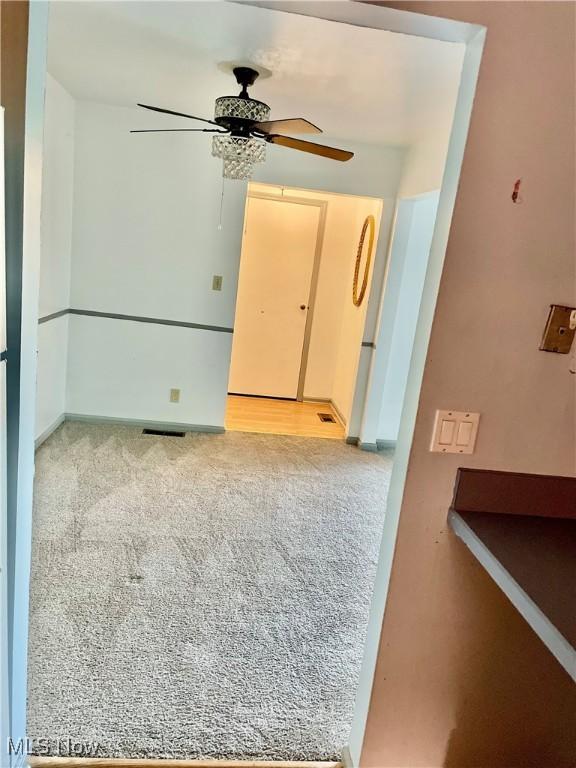 13 Charleston Sq, Euclid, OH 44143 - spare room with carpet flooring and a ceiling fan