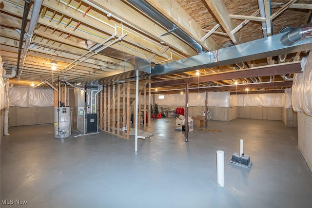13861 Woodhawk Dr, Strongsville, OH 44136 - unfinished below grade area with gas water heater and heating unit