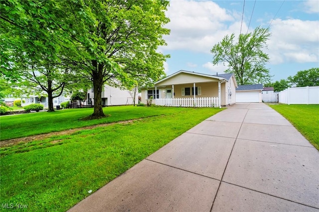5672 Stanford Ave, Youngstown, OH 44515 - view of front facade with covered porch and a garage
