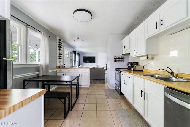 5672 Stanford Ave, Youngstown, OH 44515 - kitchen featuring stainless steel appliances, open floor plan, and white cabinetry