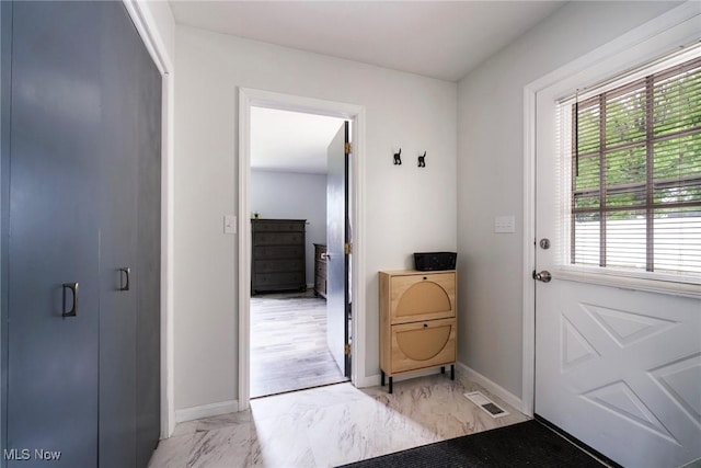 5672 Stanford Ave, Youngstown, OH 44515 - doorway featuring light marble finish flooring and baseboards