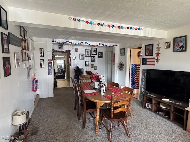 805 Warren Ave, Belpre, OH 45714 - dining area featuring carpet flooring and a textured ceiling