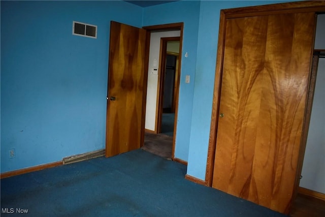 227 Greeley Ln, Youngstown, OH 44505 - unfurnished bedroom featuring carpet floors and a closet