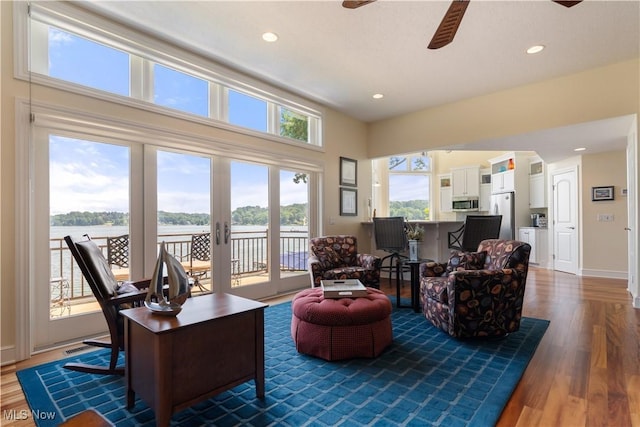 30 E Mohawk Dr, Malvern, OH 44644 - living area with a ceiling fan, plenty of natural light, wood finished floors, a water view, and recessed lighting