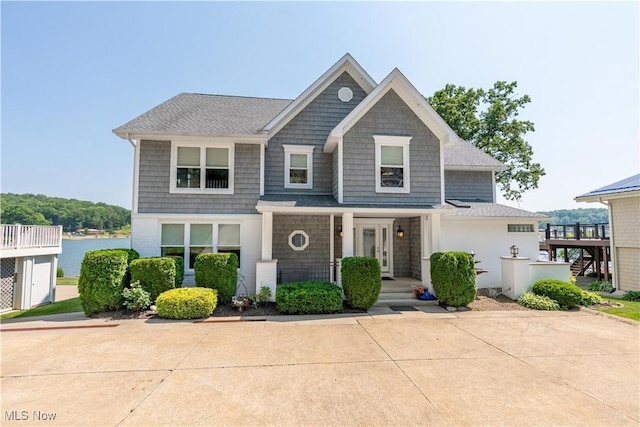 30 E Mohawk Dr, Malvern, OH 44644 - view of front of home with stairs and a shingled roof