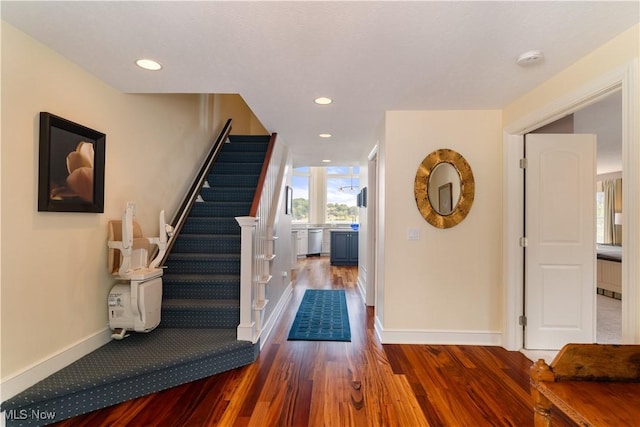 30 E Mohawk Dr, Malvern, OH 44644 - entrance foyer featuring wood finished floors, stairs, radiator, and recessed lighting