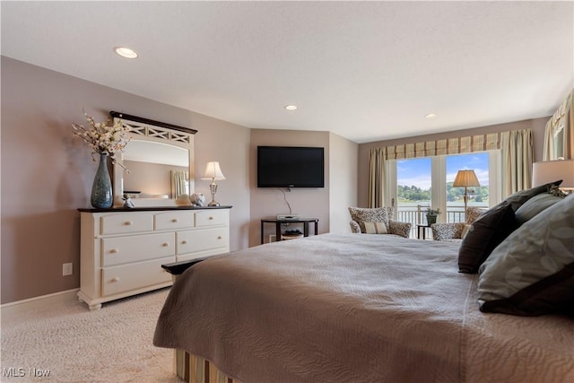 30 E Mohawk Dr, Malvern, OH 44644 - bedroom with access to outside, light colored carpet, and recessed lighting