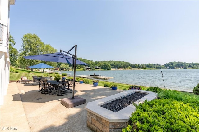 30 E Mohawk Dr, Malvern, OH 44644 - view of property's community featuring a fire pit, a water view, and a patio