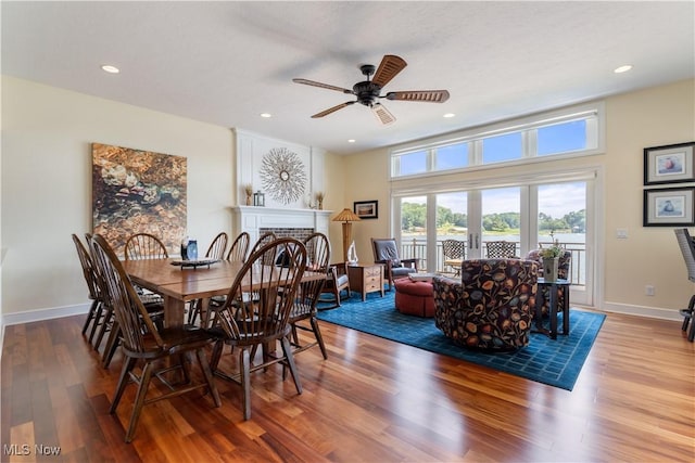 30 E Mohawk Dr, Malvern, OH 44644 - dining space featuring wood finished floors, a ceiling fan, recessed lighting, and a brick fireplace